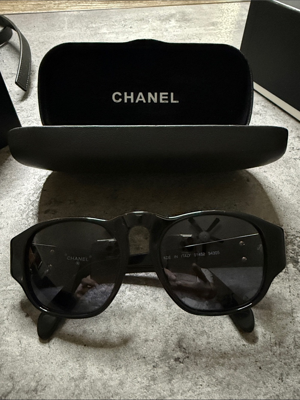 CHANEL Black Frame Sunglasses with Dark Lenses
